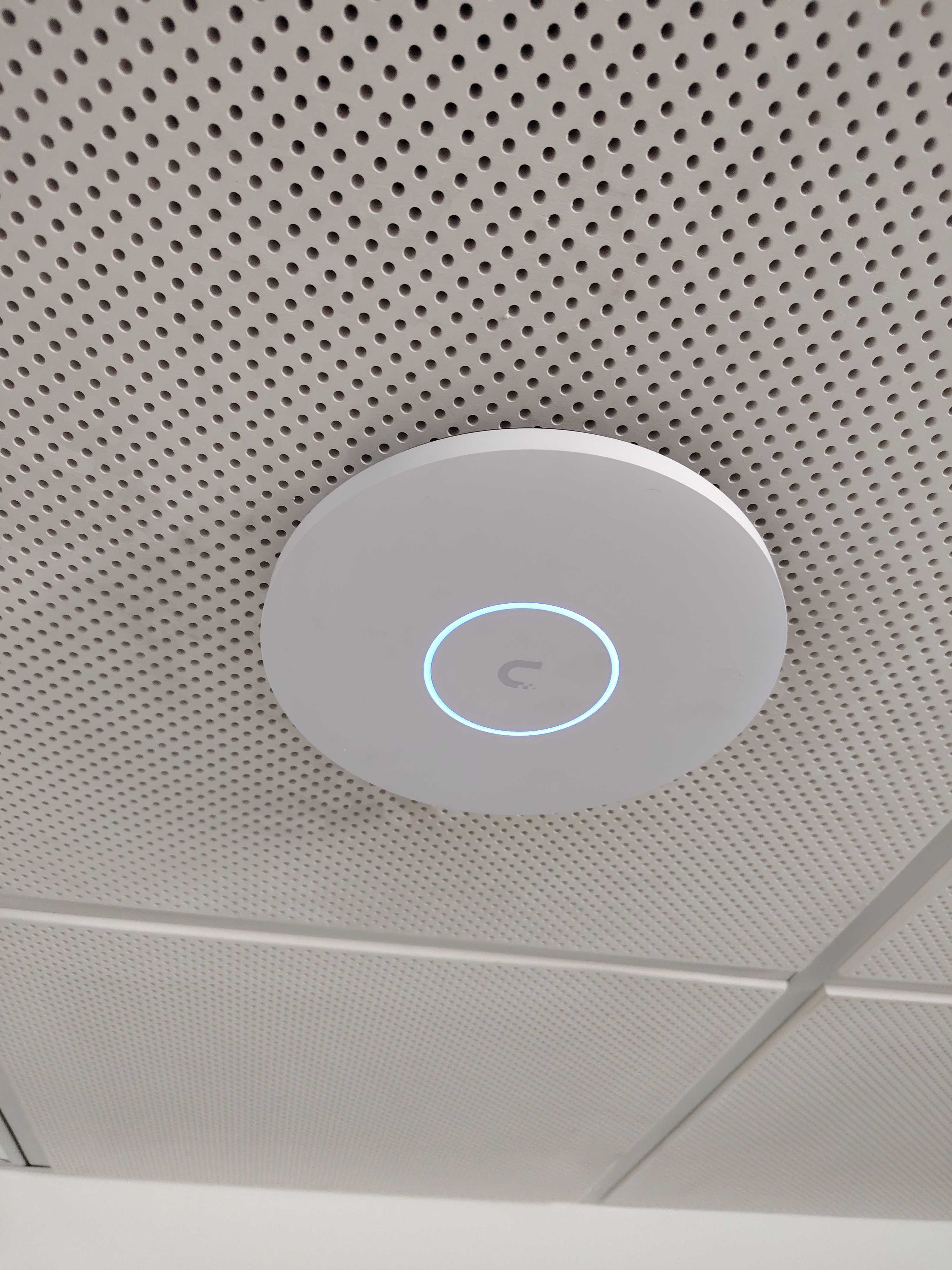 UniFi access point mounted on ceiling
